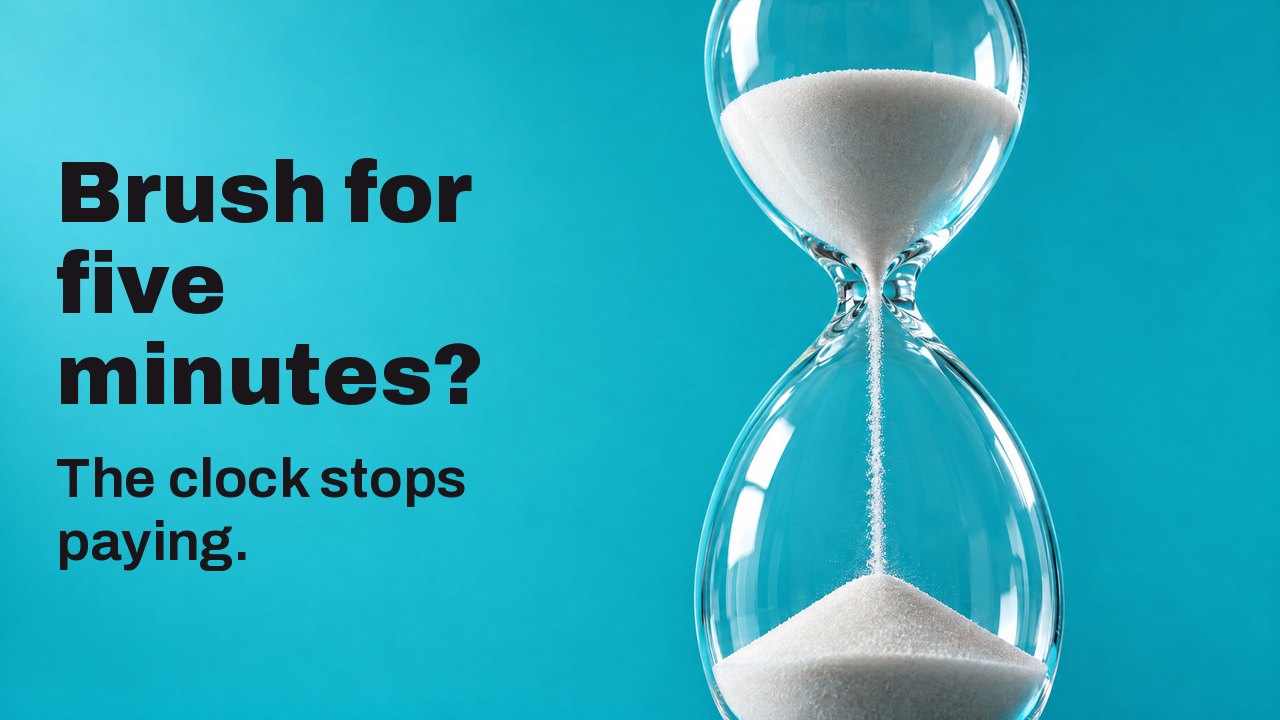 Brush for five minutes? The clock stops paying. An hourglass with white sand streaming through its neck, seen from below against bright turquoise.