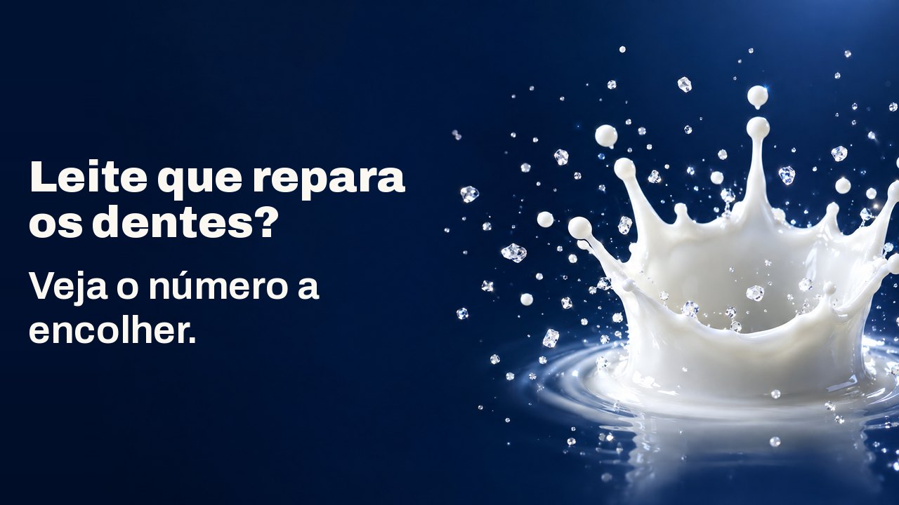 Leite que repara os dentes? Veja o número a encolher. Uma coroa de gota de leite congelada no ar com pequenos cristais cintilantes, sobre azul marinho profundo.