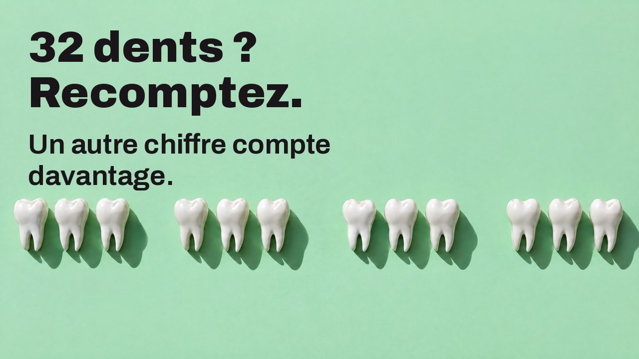 32 dents ? Recomptez. Un autre chiffre compte davantage. Vu d’en haut : une rangée de sculptures de dents blanches sur vert menthe, avec des trous là où il en manque.