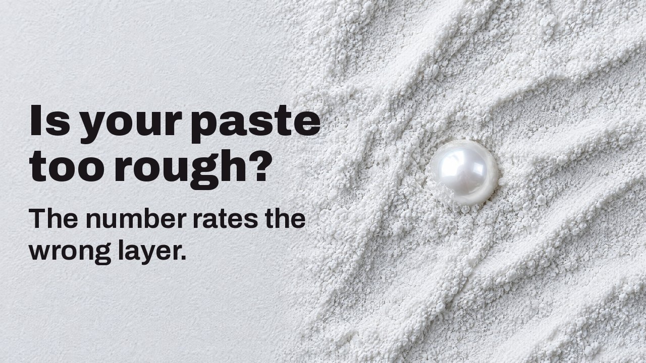 Is your paste too rough? The number rates the wrong layer. Seen from above: a single glossy pearl half buried in fine white abrasive powder.