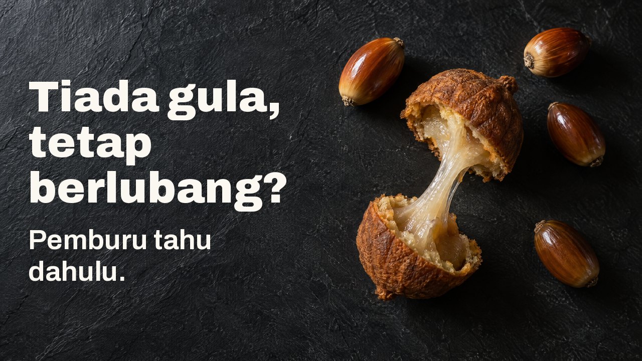 Tiada gula, tetap berlubang? Pemburu tahu dahulu. Dari atas: buah ek yang dikupas dan kek buah ek terbelah dengan jalur kanji melekit di antara dua belahannya, di atas batu loh gelap.