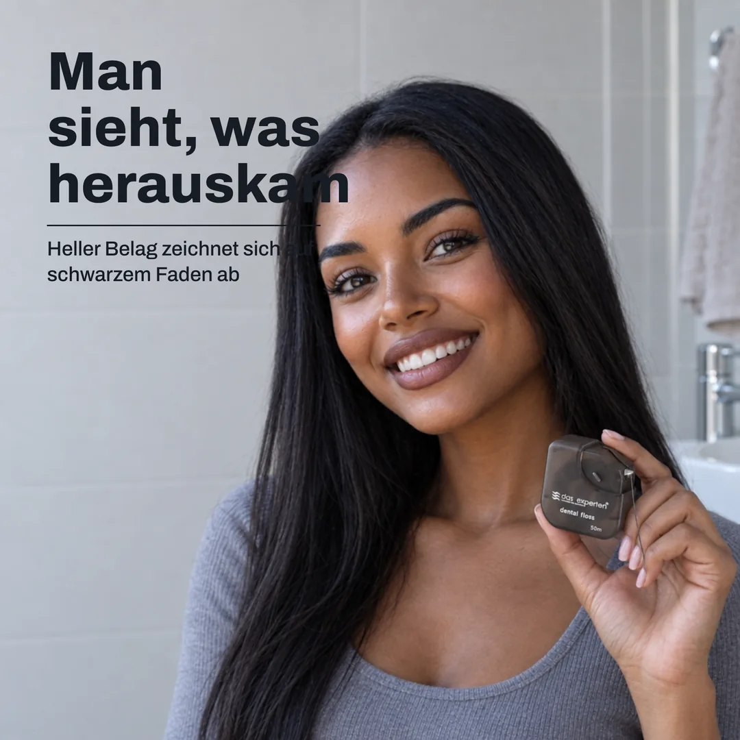 Man sieht, was herauskam — Heller Belag zeichnet sich auf schwarzem Faden ab