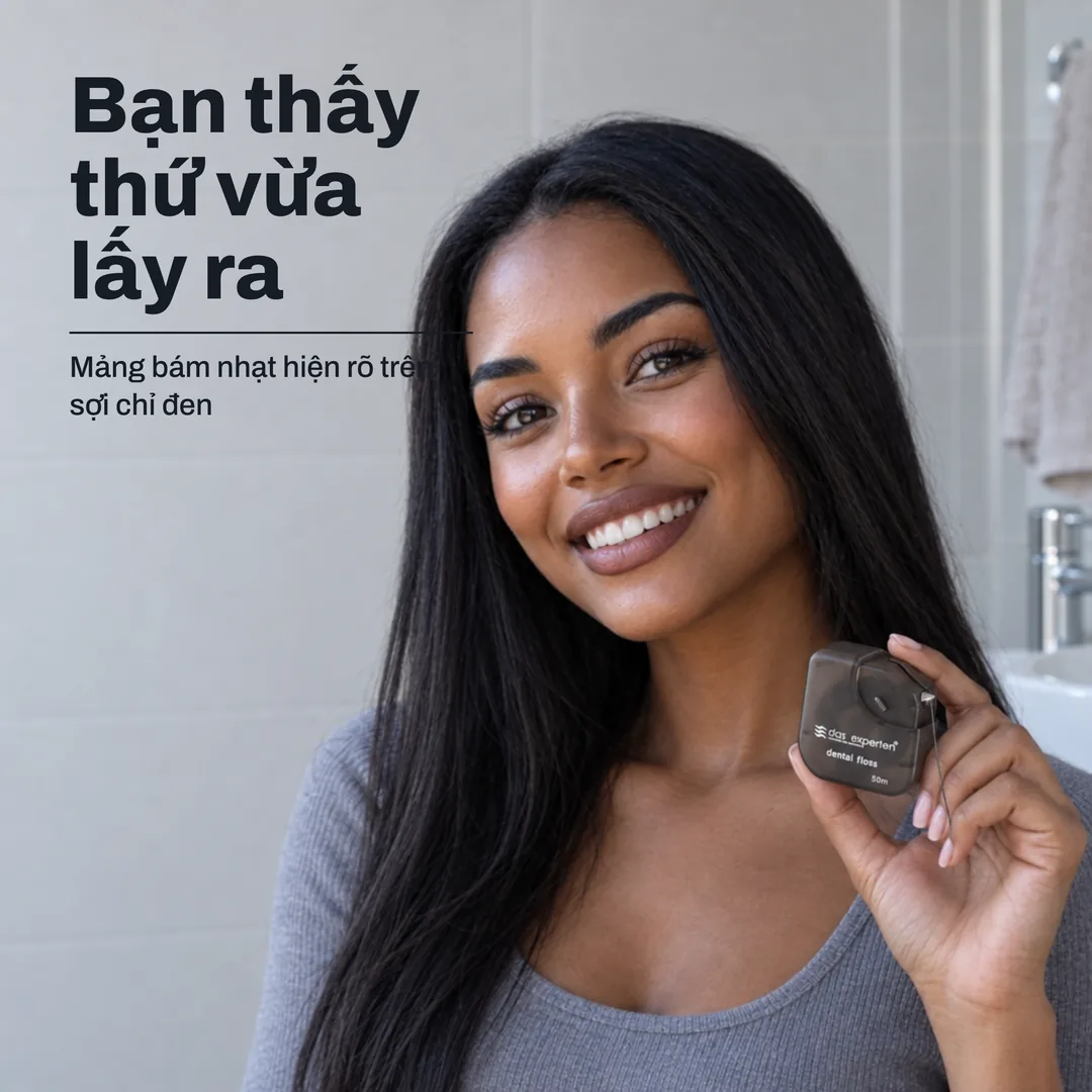 Bạn thấy thứ vừa lấy ra — Mảng bám nhạt hiện rõ trên sợi chỉ đen